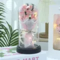Artificial soap rose flower bouquet in glass dome with led lights and gift box detail view - 7-Flower Pearl Yarn LED Gift Bag Style / Girly Pink
