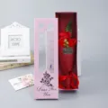 Soap flower bouquet gift box featuring three red roses in a pink window box for romantic gift details. - Flower Bouquet Gift Box / Bright Red