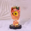 Glass dome artificial soap rose bouquet with LED string lights for romantic Valentine's Day gift. - Sunset Orange