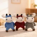 Detailed view of cute cartoon bull plush toys in blue, red, and grey, soft and cuddly. - Kung Fu Bull / 20cm / Multicolor