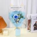 Handmade crochet blue rose flower bouquet in transparent gift bag with LED light strings. - 6 Pcs with Lights Gift Bag / Blue Rose