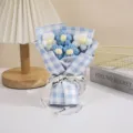 Handmade knitted flower bouquet with blue checkered wrapping paper and sweet ribbon gift. - Blue