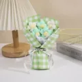 Knitted crochet flower bouquet with green plaid wrapping paper, perfect gift for Valentine's Day. - Green