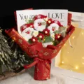 Handmade Christmas knitted wool flower bouquet gift with Santa Claus doll and festive wrapper - Bouquet + Handbag + Light String / Santa Claus Red Wool Flower Finished