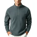 Detail shot of men's half-zip fleece pullover collar and zipper craftsmanship in dark grey. - S / Tops / Gray