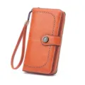 Portefeuille long en cuir orange pour femme avec dragonne et bouton decoratif metal - Orange