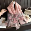 Pink silk scarf detail showing exquisite lotus embroidery, elegant drape and soft texture. - Pink