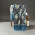 Exquisite ethnic embroidered cashmere-feel scarf detail, featuring intricate floral patterns and tassels. - Blue