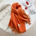 Sciarpa accogliente double-face in eco-cashmere tinta unita lunga con frange da donna - Arancione double-face