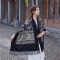 Detailed view of the autumn winter women ethnic embroidered cashmere feel tassel shawl scarf. - Black