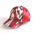 Close-up detail of the ethnic print baseball cap featuring vibrant multi-color patterns. - Atlas Pattern 15