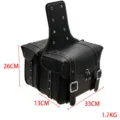 Motorcycle saddlebag detail view, waterproof leather tool storage bag with metal buckles. - Black Pair