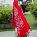 Red embroidered cashmere-feel winter scarf with ethnic sunflower pattern and elegant tassels. - Bright Red