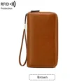 Brown PU leather long wallet with wrist strap and secure RFID protection design for daily use. - Brown