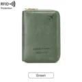 Green RFID blocking travel wallet and passport holder for secure daily card storage. - Green