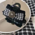 Μαύρο και λευκό κλιπ μαλλιών με κομψό φιόγκο και λαμπερά στρας για καθημερινό στυλ. - Κλιπ Μαλλιών Pied-de-Poule