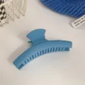 Matte blue hair claw clip for women, minimalist curved shark clip for thick hair styling. - Light Straight A