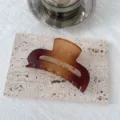 Detail shot of the gradient double-color hair claw clip on stone surface, elegant hair tool. - Small Cube / Coffee