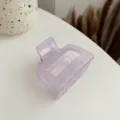 Small acrylic hair claw clip for women, square hollow design, elegant purple hair accessory. - Purple