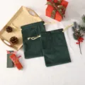 Green velvet gift bags detail view, soft pouch with golden drawstring for jewelry and holiday candy. - Blank Style (Printable Logo)