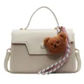 Women canvas PU leather handbag casual crossbody bag with cute plush bear pendant. - With Pendant / Off White