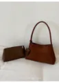 Detailed view of the retro brown suede underarm shoulder bag with matching clutch pouch. - With Small Pouch / 6139 Coffee