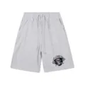 Vue détaillée de short streetwear gris avec graphique de casque de crâne et cordons. - 303 Gris Chiné