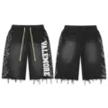 Geverbte schwarze Streetwear-Shorts mit Seiten-Flammen-Print und vertikalem Buchstaben. - S / Unterteile / Gewaschenes Schwarz