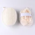 Detail view of double-sided loofah and mesh bath sponge scrubber with elastic hand strap. - 10*14cm / Milky White