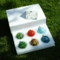 Detailed view of colorful blown glass suncatcher decorative balls neatly arranged in gift box. - 6-Piece Set