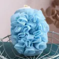 Blue mesh bath sponge scrubber exfoliating mitt for body back cleaning and daily shower use. - Blue