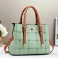 Borsa a mano verde a quadri in pelle sintetica con manici marroni e tracolla regolabile. - Verde