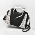 Borsa a mano nera a quadri elegante con manico a orecchio di gatto in metallo per donna. - Nero