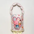 Pink checkered bucket bag detail featuring a cute cartoon rabbit and ice cream graphic handle. - Rabbit Padded Bag