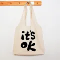 Casual canvas tote bag, large capacity daily shoulder bag with letter print, minimalist style. - IT'OK Letter Print Vest Bag