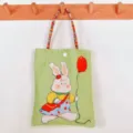 Cute cartoon rabbit print canvas handbag with colorful woven straps and snap closure variant. - Balloon Rabbit - Colorful Handbag