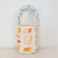 Canvas bucket bag with cute cartoon bread print and blue puffy handle, variant style. - Bread Blue