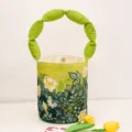 Canvas bucket bag with green puffy handle and Van Gogh wild rose oil painting print style. - Wild Rose