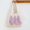 Cute polka dot cat print canvas tote bag, large capacity casual shoulder bag for women. - Purple Polka Dot Cat