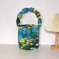 Canvas fabric bucket bag with creative stuffed bead handle and artistic oil painting print - Water Lilies