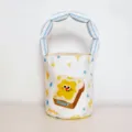 Canvas bucket bag with cute cartoon toast print and blue striped bubble handle for women. - Cotton-Padded Bucket Bag / Toast