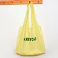 Yellow canvas tote bag with green letters print, casual large capacity shoulder bag. - AREYOU Vest Bag / Yellow