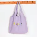 Purple canvas tote bag with colorful Bonjour print, large capacity casual shoulder bag. - Purple