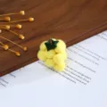 Close-up detail of yellow wool felt grape accessory for DIY hats and handmade hair clips. - Yellow Grape