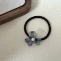 Cinta de pelo de flor de acetato vintage francés con centro de perla y detalle elástico - Azul lago