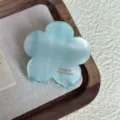 Detailed view of the light blue flower hair claw clip, showcasing elegant styling and texture. - Sky Blue 4.5cm