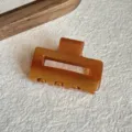Amber acetate hair claw clip close-up shot, stylish mini geometric hair accessory detail view - 4.3cm / Brown