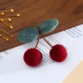 Handcrafted wool felt cherry DIY charm for cute hats, hair clips, and handmade accessories. - Cherry