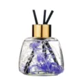 Reed diffuser bottle with purple dried flowers and black sticks, elegant home fragrance decor essential oil. - Lavender