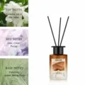 Reed diffuser set with black sticks and gradient brown glass bottle for home fragrance. - Gold Gardenia Jade Leaf
